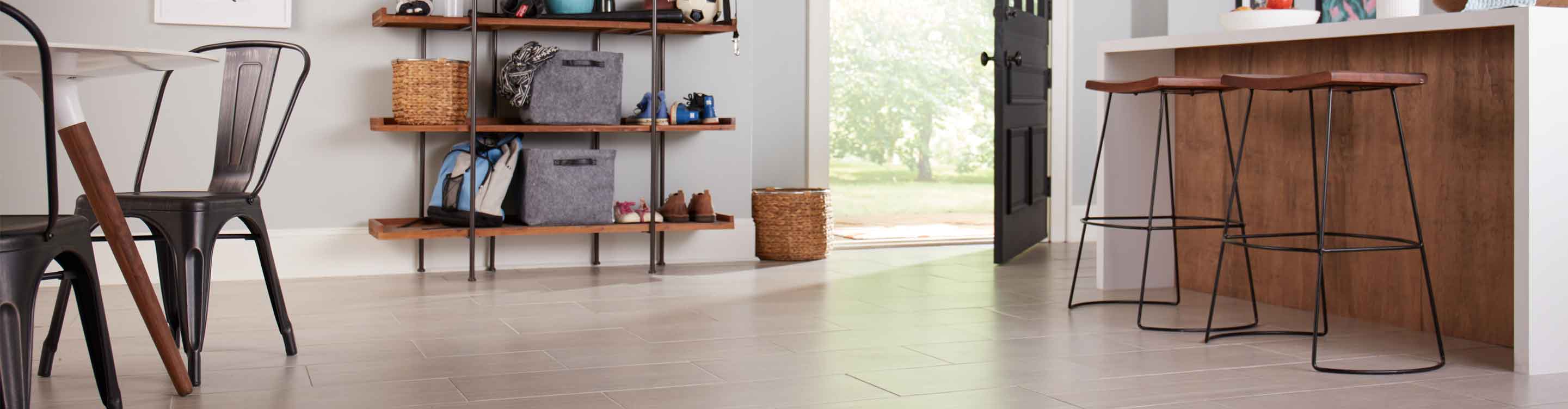 large-format light brown tile flooring in kitchen